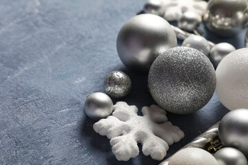 Christmas balls and decorative snowflake on blue background