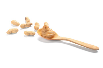 Wooden spoon with tasty peanut butter and nuts on white background