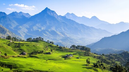 Stunning mountain range towers over lush green hills, creating a serene landscape. Sunlight bathes the scene, highlighting the natural beauty and tranquility of the countryside