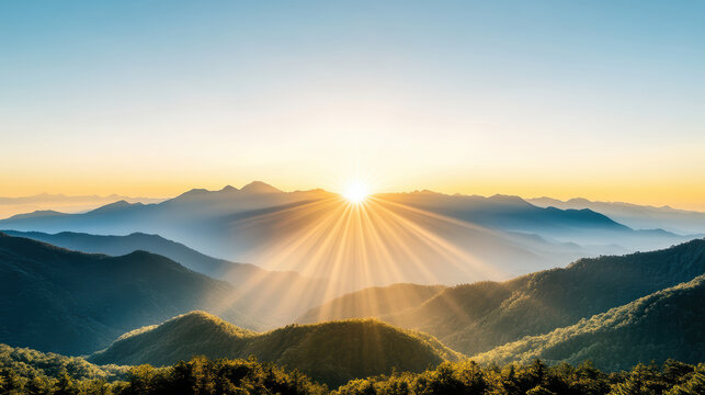 stunning sunrise over mountain range with misty layers