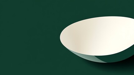 A green and white bowl sits on a dark background