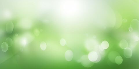 Obraz premium A serene blur of green tones with soft bokeh lighting, evoking tranquility and nature.