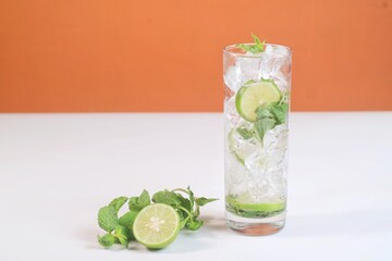 iced lime soda with mint - refreshing drink isolates on white background
