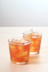 a glass of ice tea isolated on white background

