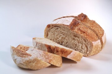 Country loaf sourdough bread on woodden table. Fresh fragrant bread on the table. Food concept. Healthy Food.
