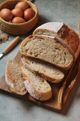Country loaf sourdough bread on woodden table. Fresh fragrant bread on the table. Food concept. Healthy Food.
