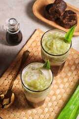 es Cendol  is a sweet ice dessert made from pandan short vermicelli with coconut milk, and palm sugar syrup.
