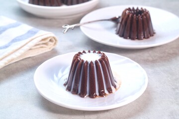 Homemade Dessert Puding coklat or chocolate pudding on white background, have a sweet taste. Made...