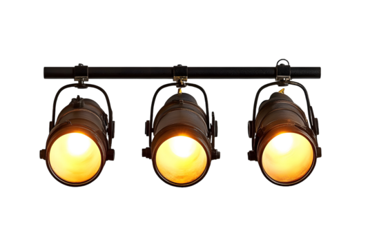 Three Industrial Style Ceiling Mounted Spotlights Illuminated in Warm Light.