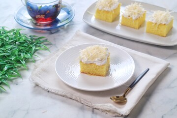 Sliced Sponge Cake , fresh baked fluffy cake with cheese topping