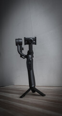Naklejka premium camera on tripod