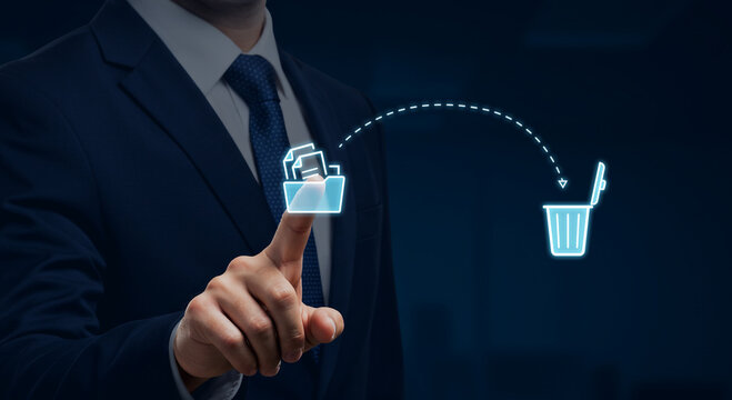 Businessman deleting files with a digital interface, represented by a Recycle Bin icon. A clean and efficient method for data management and file recycling. - Powered by Adobe