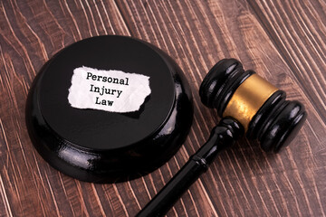 Judge's gavel with a piece of paper with the text Personal Injury Law