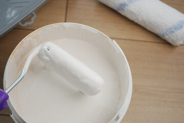 Painting supplies arranged for a home renovation project indoors