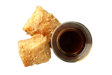 PNG, Ramadan. Baklava in a plate with a glass of tea,.isolated on a white background.