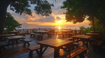 Fototapeta premium Sunrise cafe overlooking ocean, wooden tables, benches
