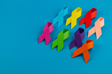 Colorful ribbons symbolize global health campaigns for cancer awareness
