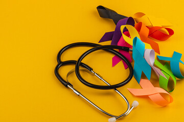 Promoting health awareness through colorful ribbons and medical tools