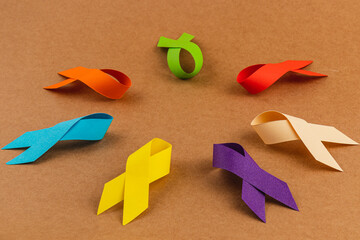 Colored awareness ribbons represent various health campaigns and causes