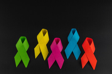 Colorful awareness ribbons representing various health campaigns and causes