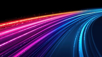 A vibrant display of colored light trails against a dark background, evoking a sense of motion and energy.