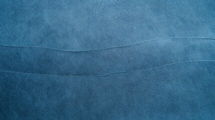 Naklejka premium Steel blue paper background showcases curved details and a matte, grainy texture. This background is a unique addition for designs seeking a blend of cool color, subtle texture, and interesting shape 