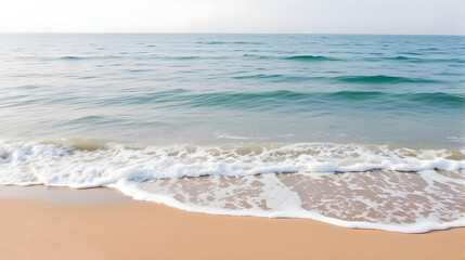 A Serene Beach with Gentle Waves Lapping the Shore