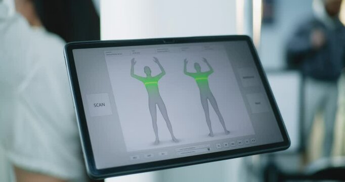Advanced Security System in Airport: Tablet Computer Screen Displaying Modern Program Interface or Analyzing Software for Human Body Scanning. X-ray Passenger Screening for Boarding Plane Flight.