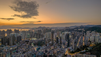 Fototapeta premium Jan 27 2025 City Skyline During Twilight Overlooking Urban Landscape, Kowloon