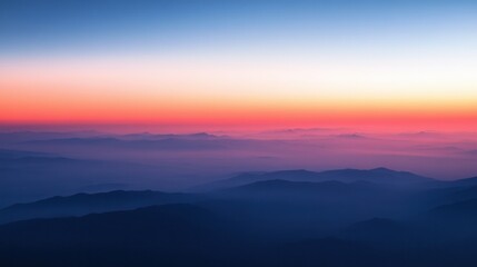 Obraz premium Serene Mountain Landscape with Vibrant Sunset and Soft Hues