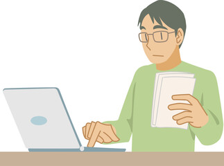 ノートPCにデータを入力する男性