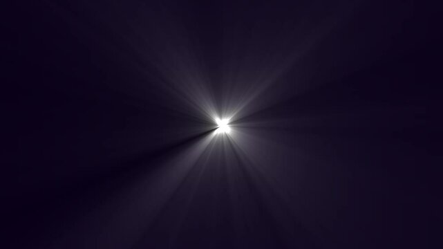Dynamic light rays loop center flickering glow colorful star optical flare light animation.