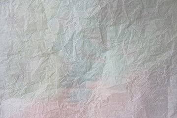 crumpled paper texture background in soft colors