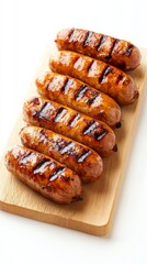 Grilled Smoked Sausages on wooden board isolated on white background copyspace