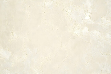 Obraz premium Subtle cream textured background with delicate imperfections creating unique visual depth