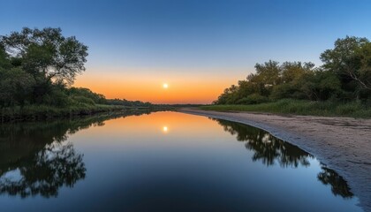 Serene Sunset Over a Calm River Reflected in Tranquil Water