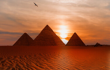 Giza Pyramid Complex at amazing sunset sky - Cairo, Egypt