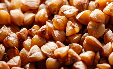 A close up of a pile of brown grains