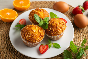 Delicious muffins with toasted almonds, handmade and baked.