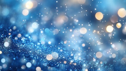 Obraz premium Abstract sparkling blurred background with blue and golden bokeh effects created by blurred lights and shimmering particles for festive or decorative themes