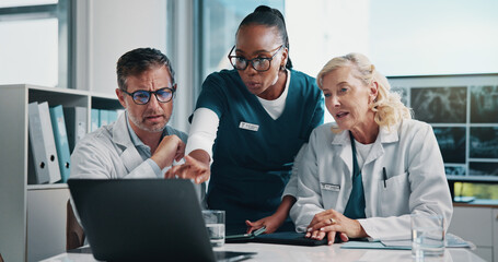 Hospital, diagnosis and doctors on laptop in meeting for consulting, teamwork and medical advice....