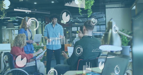 Image of data processing and diagrams over disabled and diverse colleagues discussing work