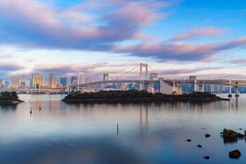 Tokyo skyline with Rainbow Bridge and Tokyo Tower at sunrise