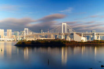 Tokyo skyline with Rainbow Bridge and Tokyo Tower at sunrise