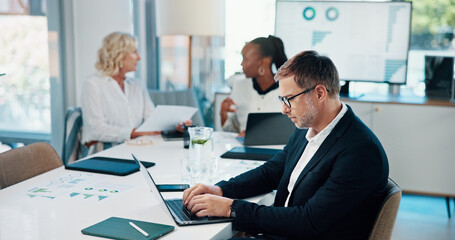 Broker, meeting or mature businessman on laptop for finance, tax research or sales revenue. Investment banker, analyst or advisor with technology for data analysis, financial account or report update