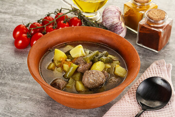 Soup with meatball and potato