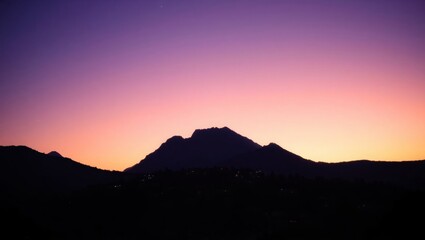 Abstract Silhouette of a Remote Mountain Village at Dusk
