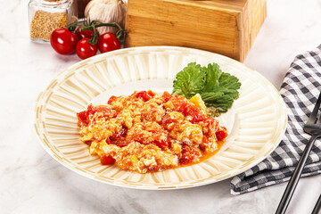 Shakshuka with tomato for breakfast