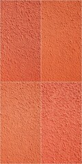 Fototapeta premium Four different shades of orange are shown in a row. The colors are light pink, peach, and a deep orange. The image is a close up of the different shades, with each one clearly visible