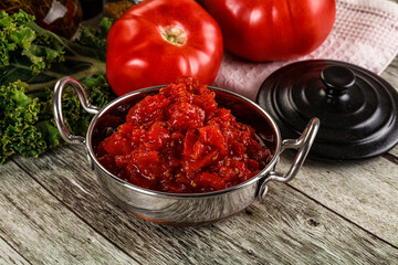 Diced ripe tomato with sauce